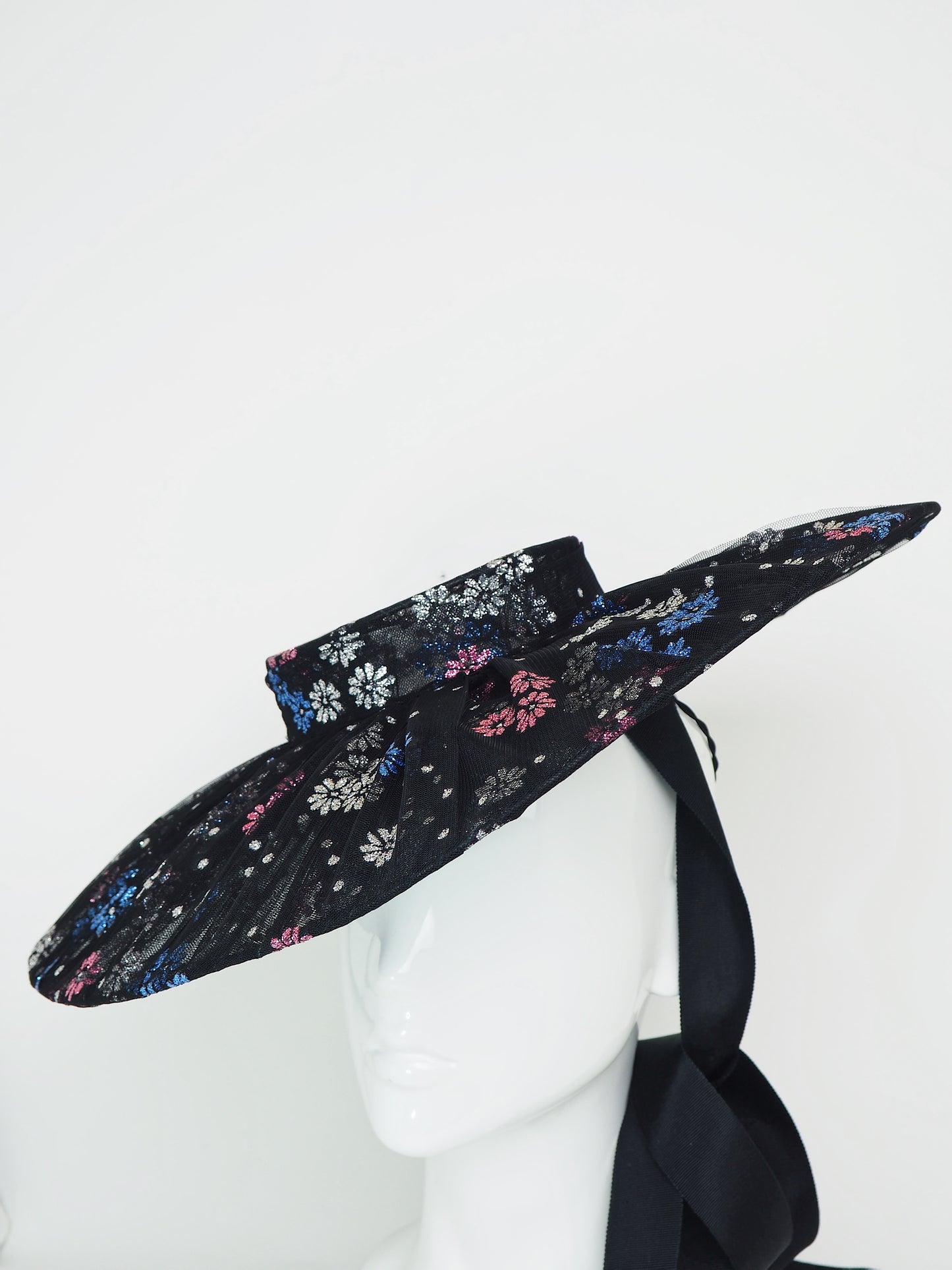 Magic Dust - Tulle wire brimmed boater with petersham ties and glitter printed flowers.
