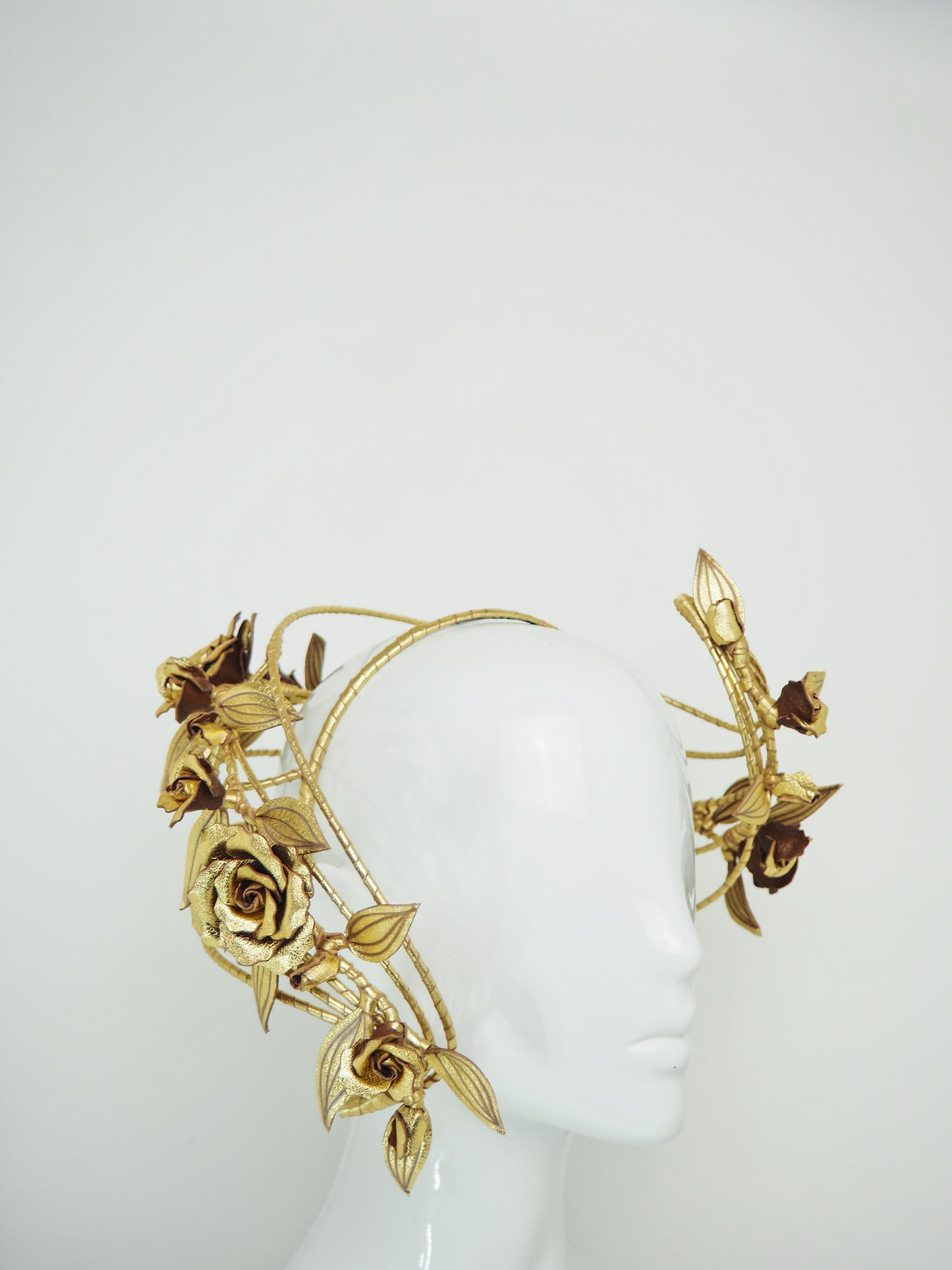 Ray of Light - Back facing wired headband with trailing golden leather rose vine detail