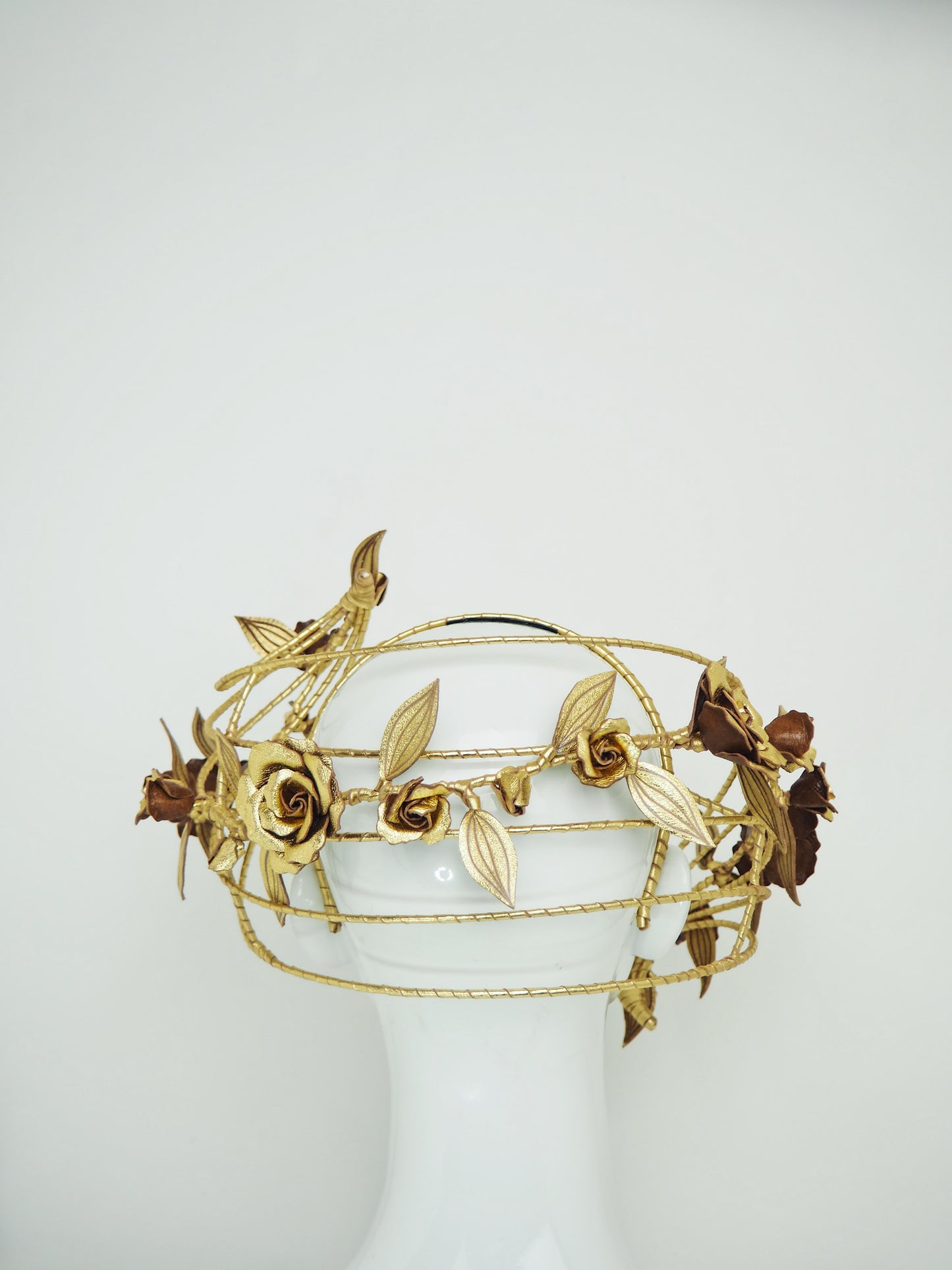 Ray of Light - Back facing wired headband with trailing golden leather rose vine detail
