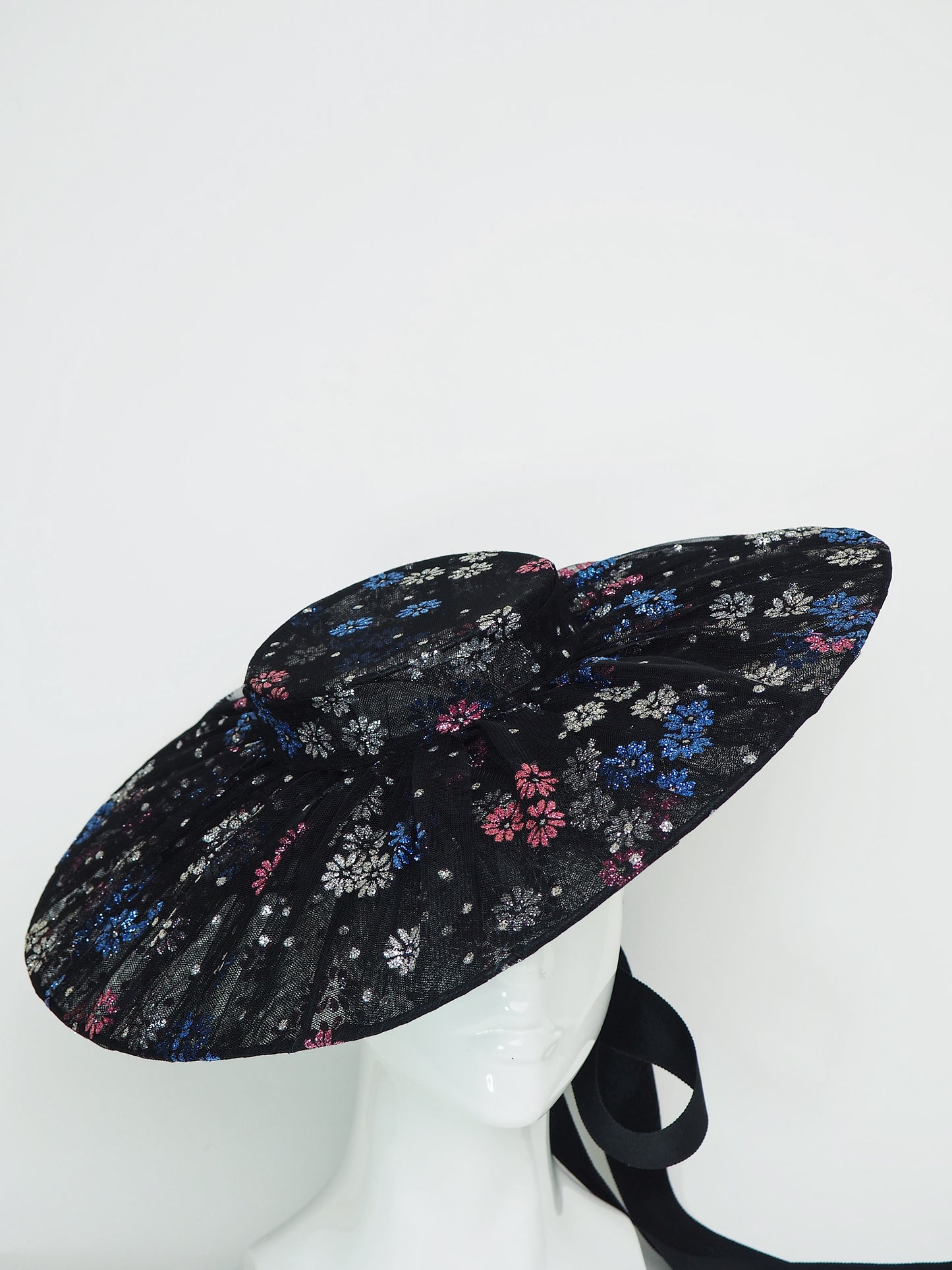 Magic Dust - Tulle wire brimmed boater with petersham ties and glitter printed flowers.