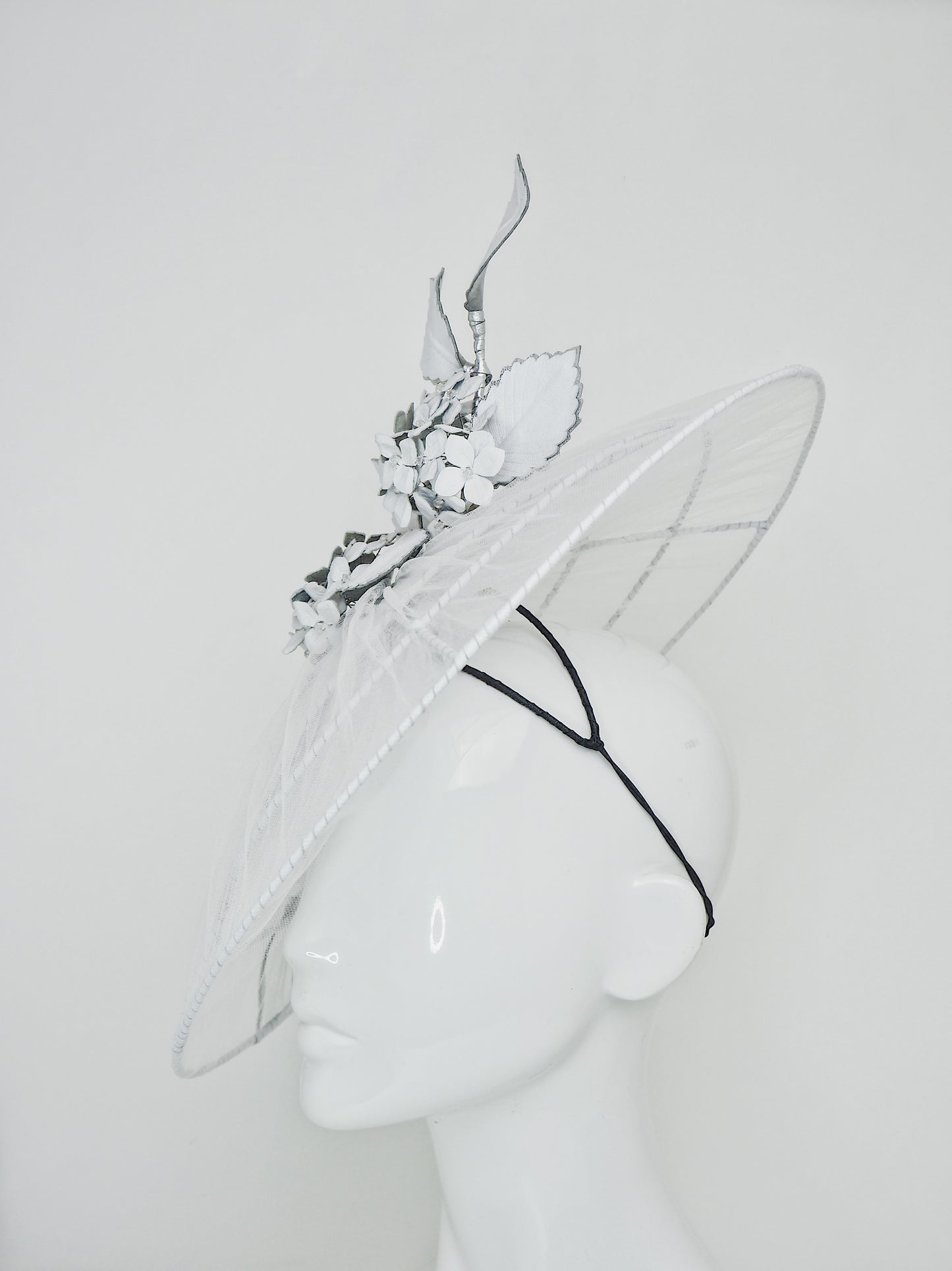 Just a Whisper - White tulle and leather brim with Hydrangeas