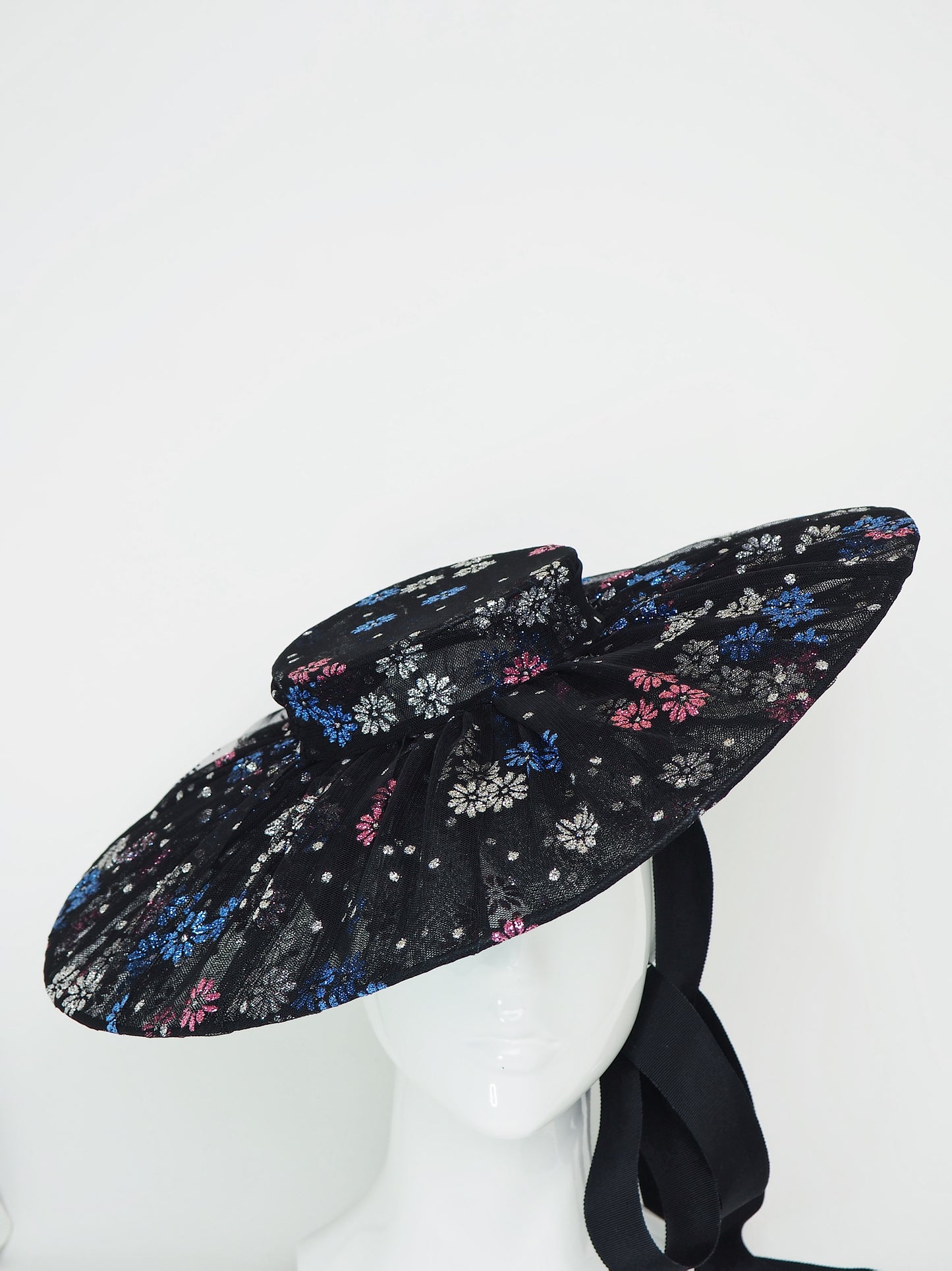 Magic Dust - Tulle wire brimmed boater with petersham ties and glitter printed flowers.