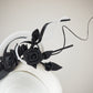 Ace of Spades - White parisisal 3D headband with leather edged crinoline swirl ,black leather flower vine and quill embellishment