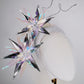 Celestial Burst - Silver and white lurex headband with iridescent starburst detailing