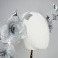 Dewdrops on Roses - Couture wraparound headpiece of sculptural silver roses sparkling with crystal dewdrops.