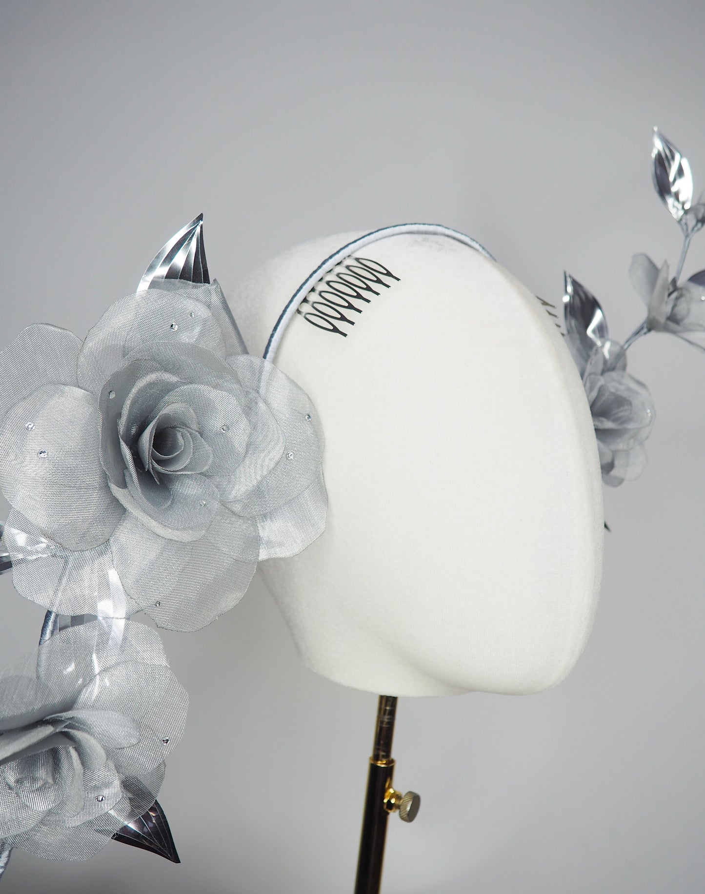 Dewdrops on Roses - Couture wraparound headpiece of sculptural silver roses sparkling with crystal dewdrops.