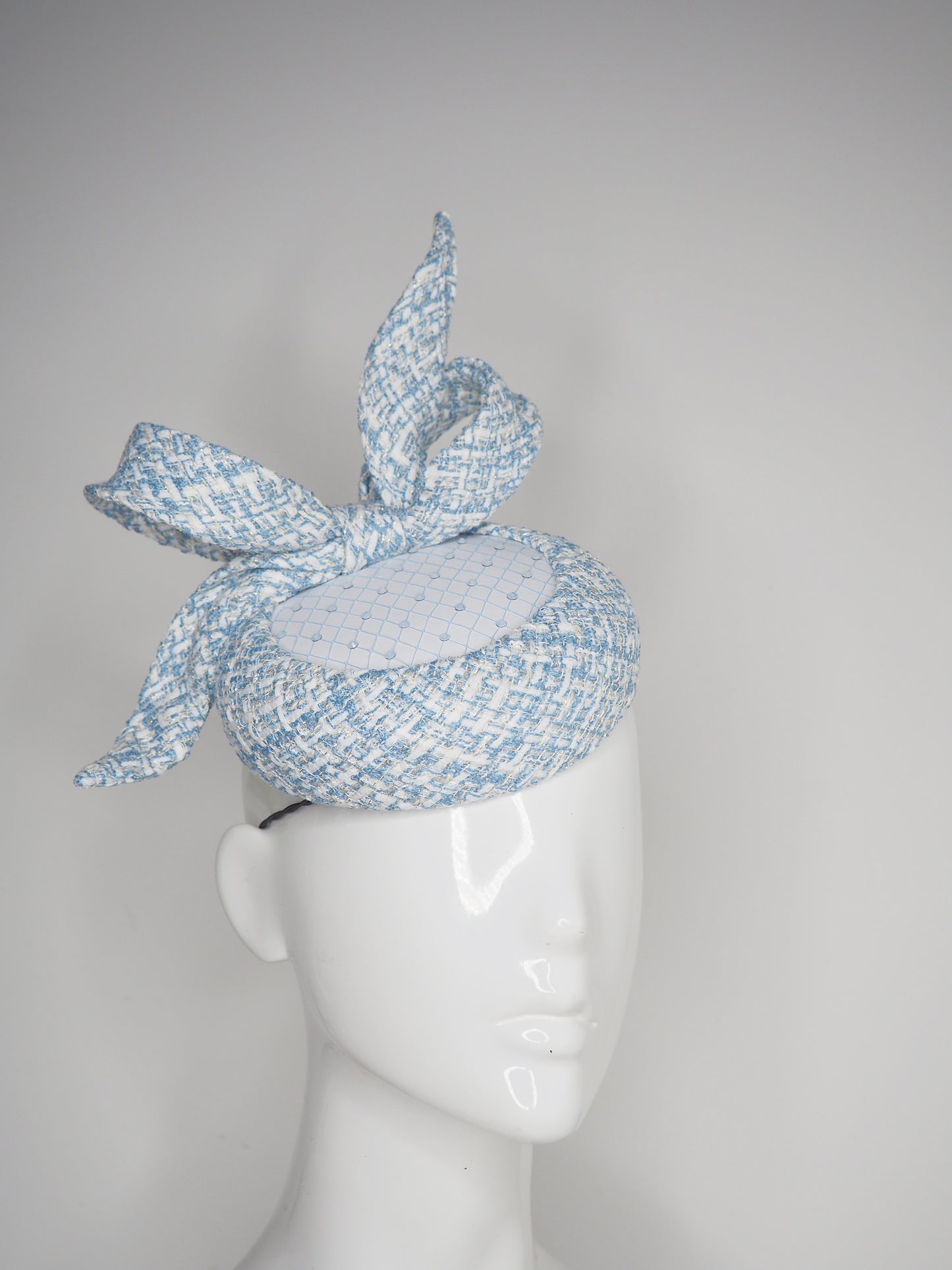 Blue Belle - Blue tweed button base with wired tweed bow and crystal veil