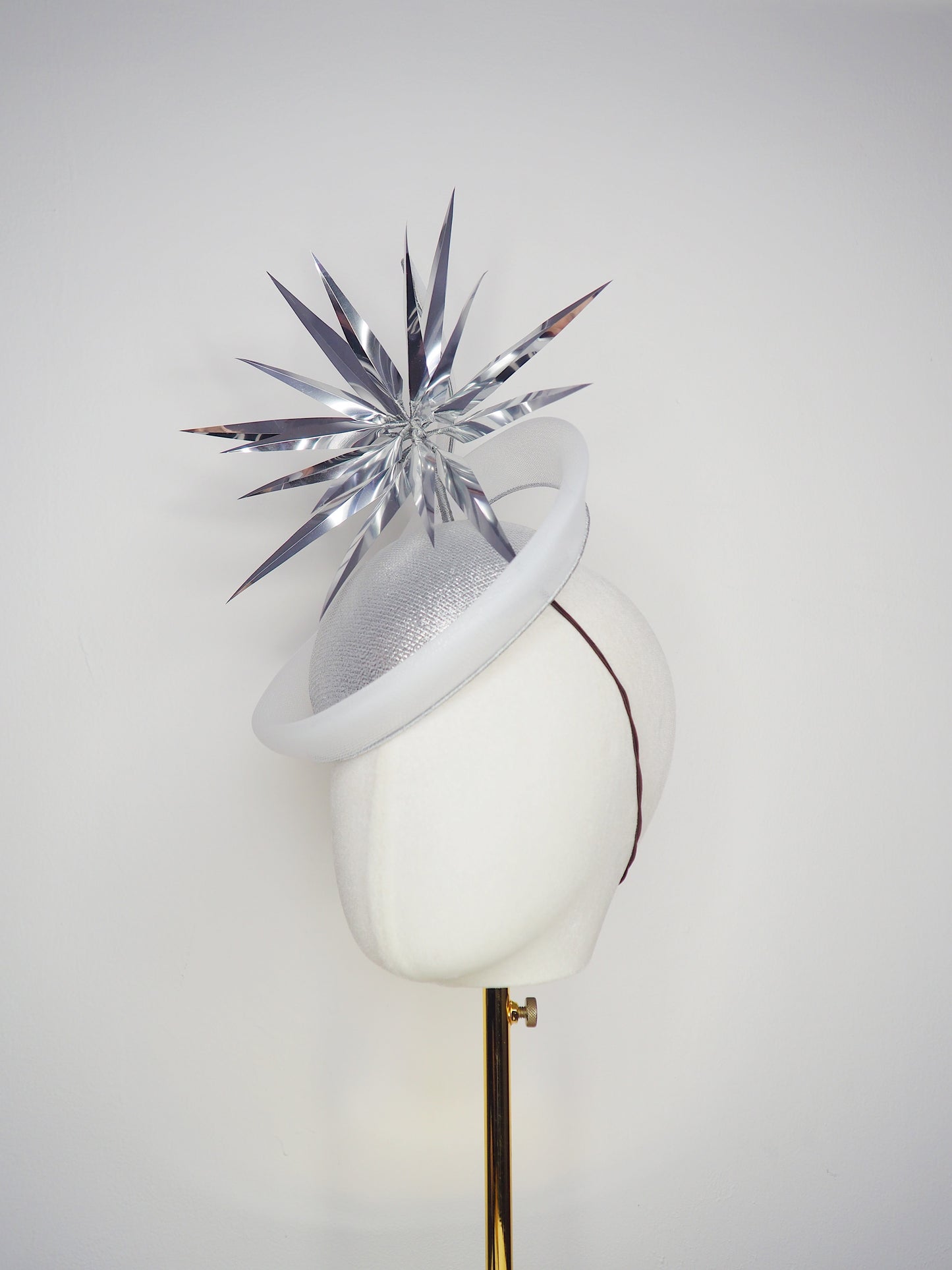 Silver Rays - Silver crinoline swirl and lurex base with floating silver starburst