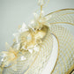 Ray of light - Wired crinoline brim with metallic swirl and pale gold crystoform Lillies.