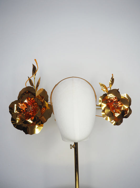 Sunlit Bloom - A wraparound floral headpiece featuring oversized golden blooms with vibrant orange centres.