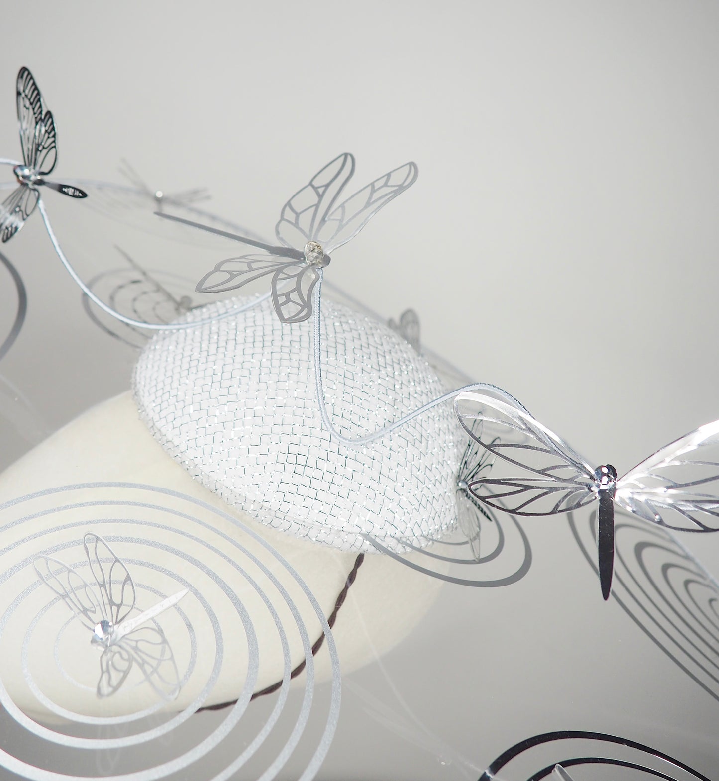 Dancing Dragonflies - Sculptural crystoform brim inspired by dragonflies dancing across shimmering water.