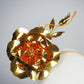 Sunlit Bloom - A wraparound floral headpiece featuring oversized golden blooms with vibrant orange centres.