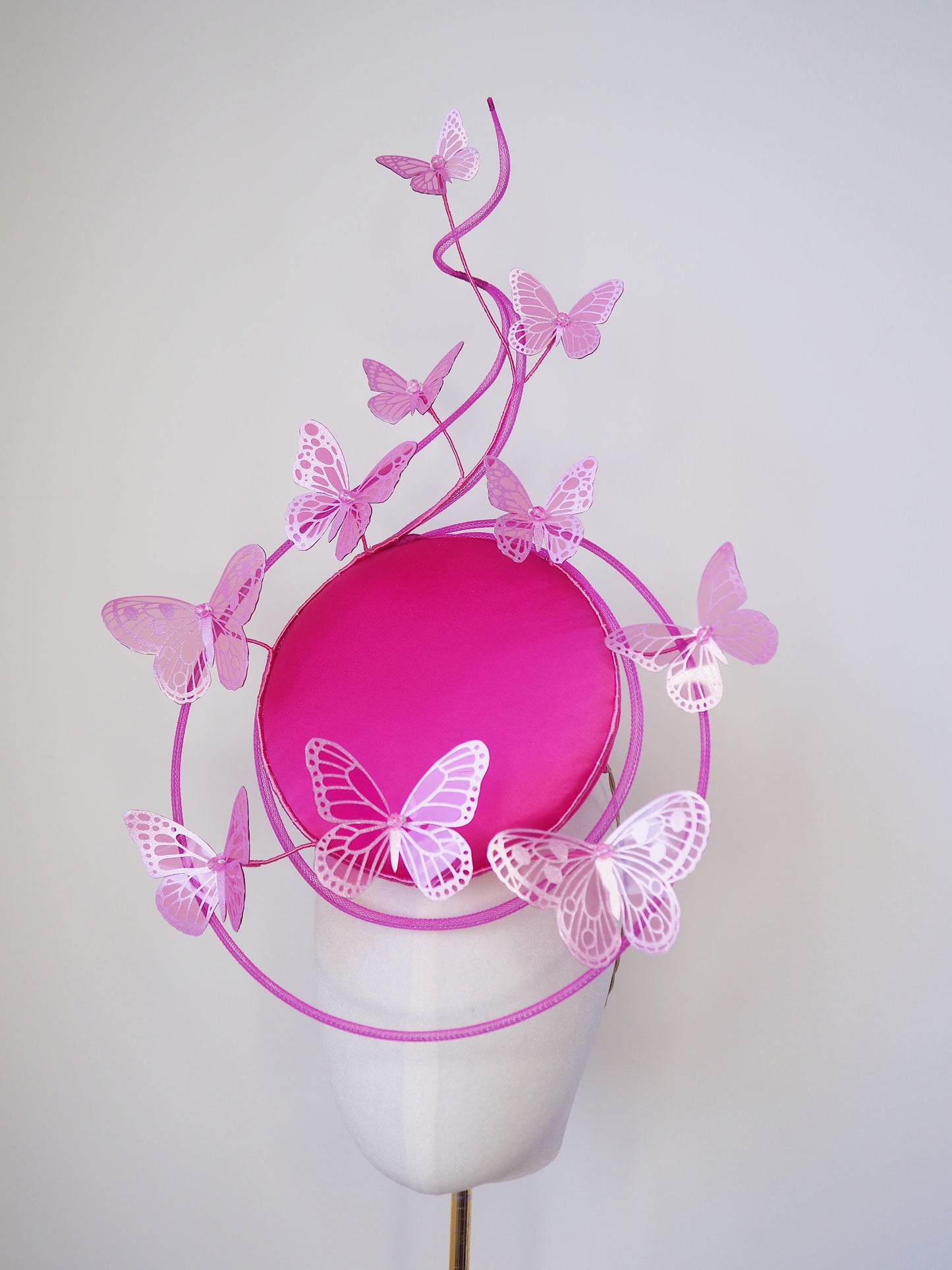 Butterfly Mirage Percher - Hot pink percher disc with tubular crinoline swirl peekaboo and cascading glitter butterflies