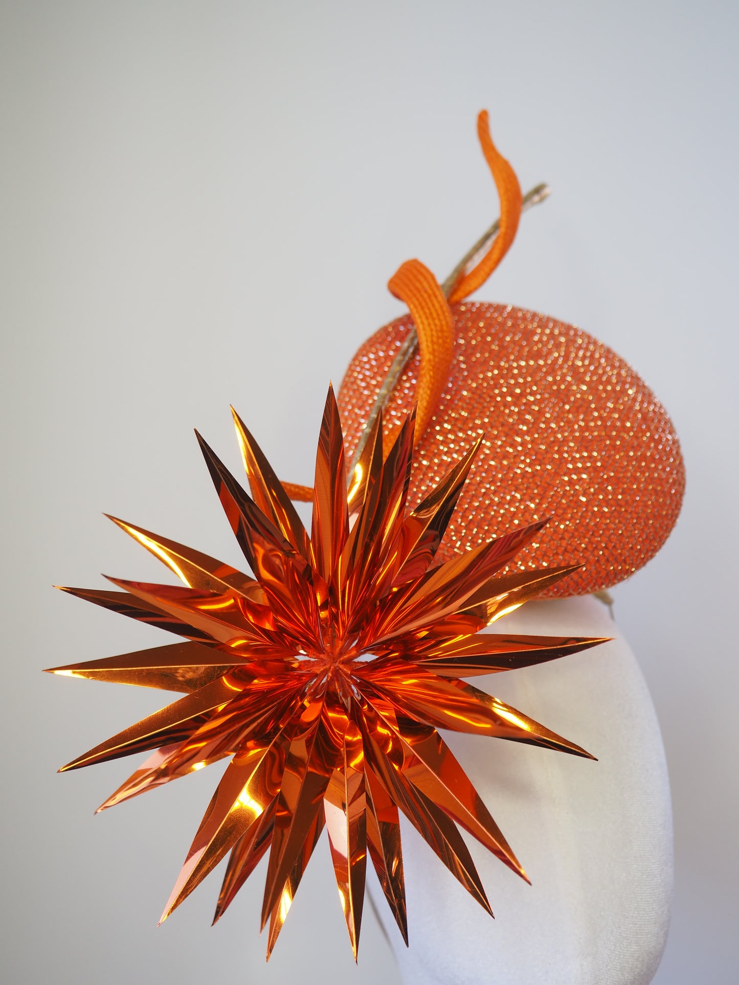 Solar Spark - Round gold and orange percher with orange sequin film starburst and gold quill detail