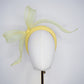 Soleil - A joyful lemon bow headpiece with pearl encrusted veil detail