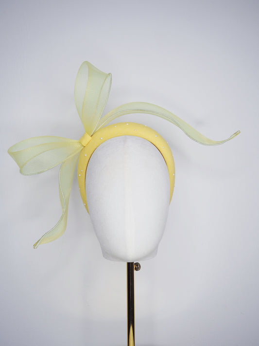 Soleil - A joyful lemon bow headpiece with pearl encrusted veil detail