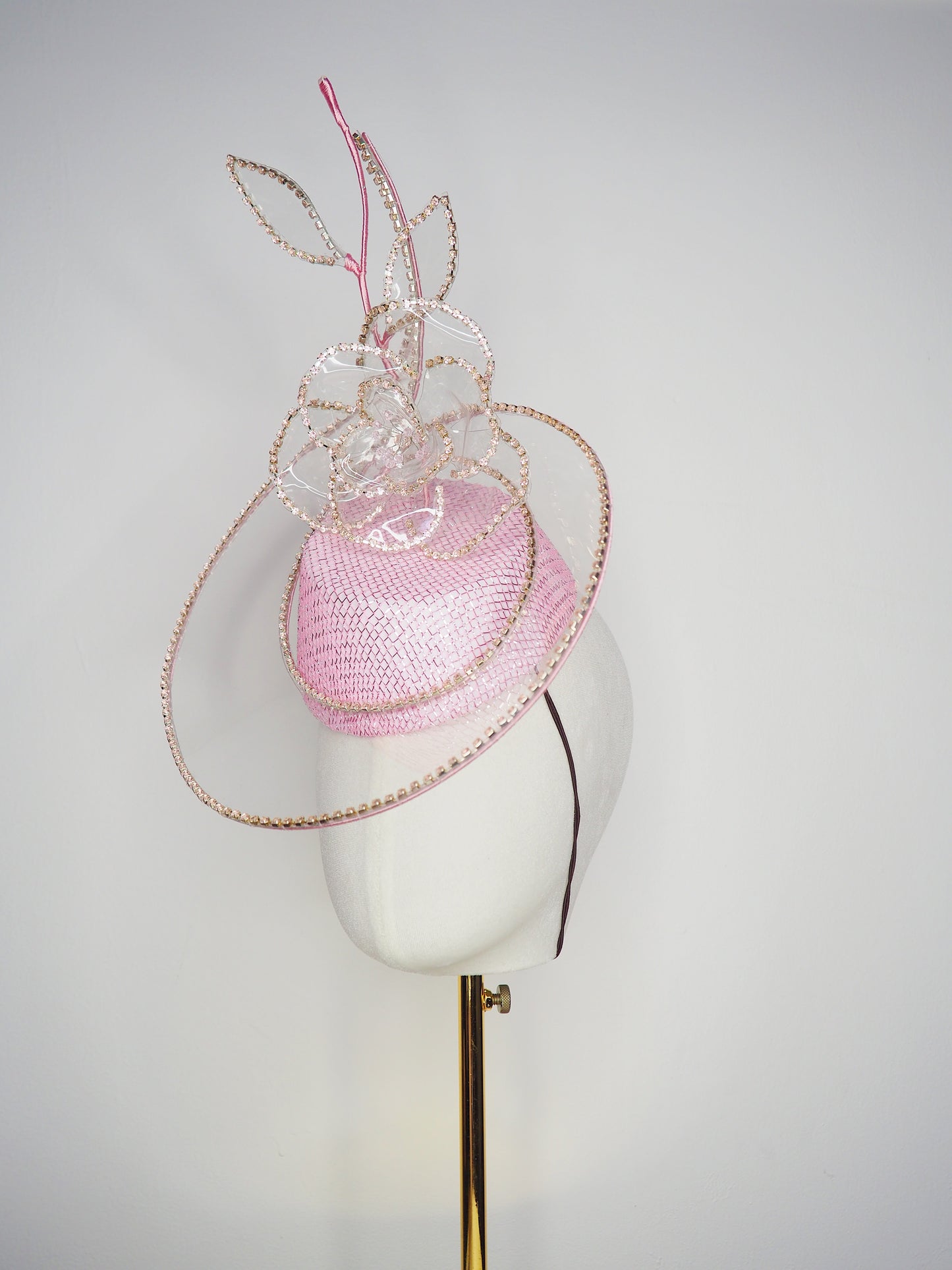 Belle Époque - pastel pink pillbox featuring a floating crystal rose surrounded by sculptural crystoform metallic swirls.