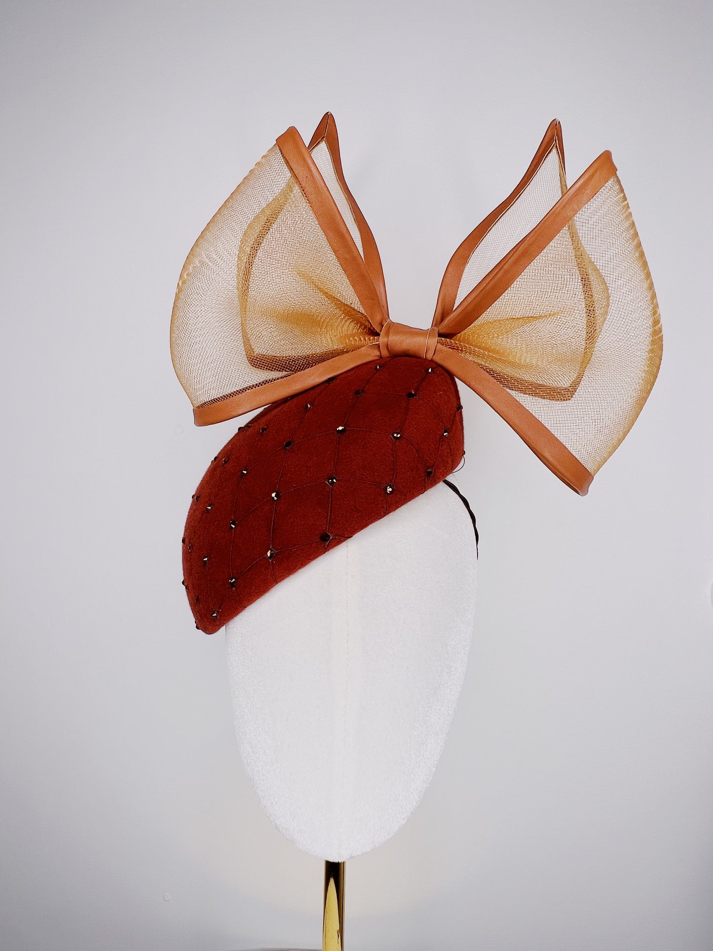 Coco Delight - Brown fur felt face hugger with dramatic crinoline bow and crystal veil detail.