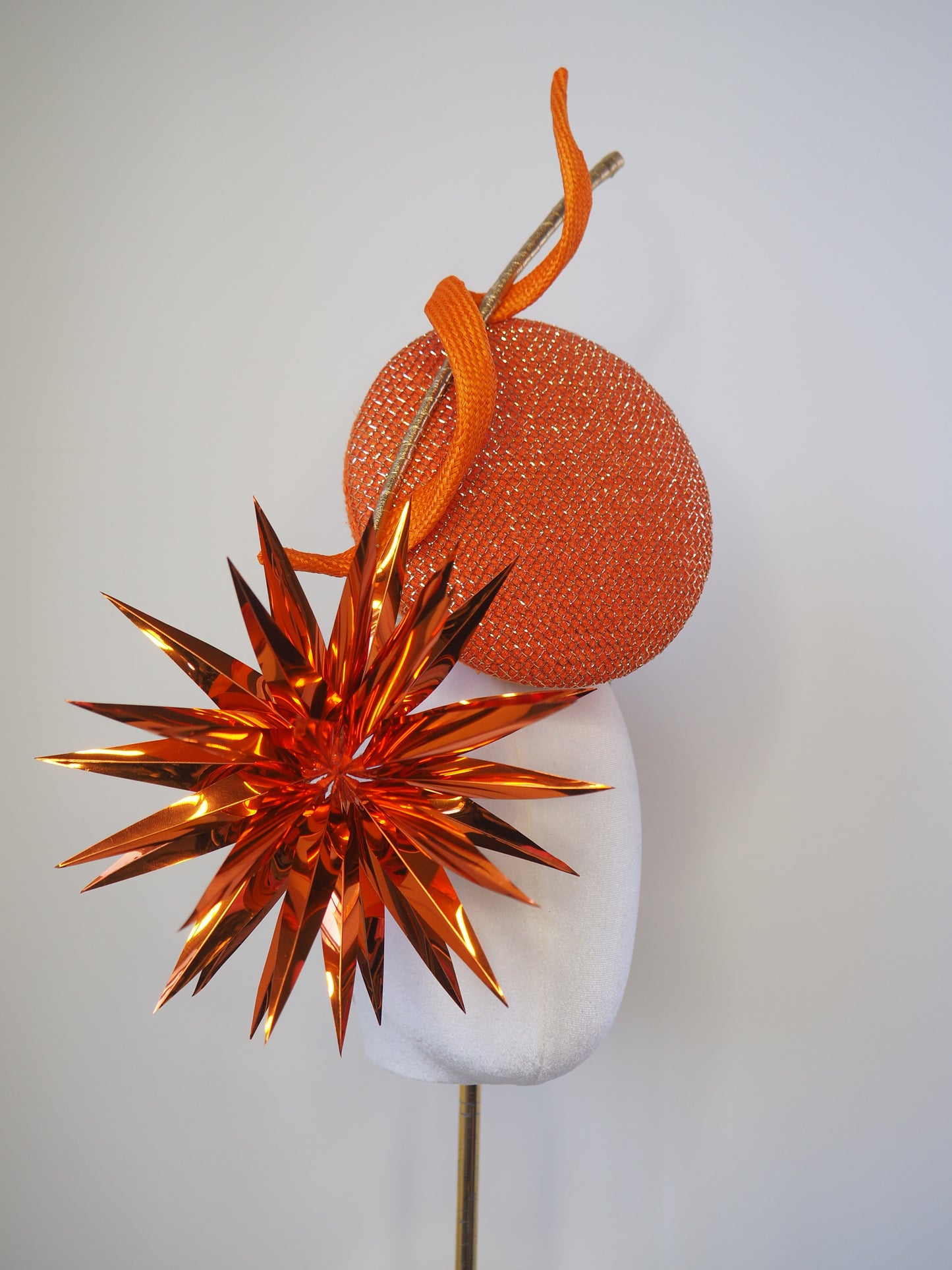 Solar Spark - Round gold and orange percher with orange sequin film starburst and gold quill detail