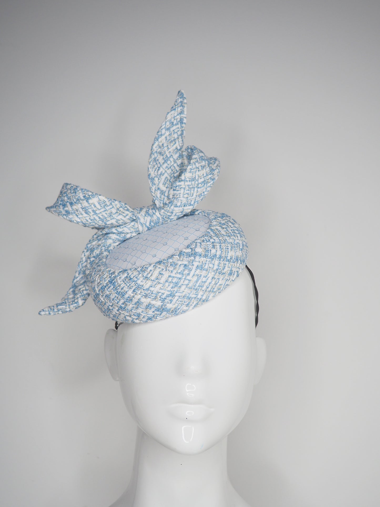 Blue Belle - Blue tweed button base with wired tweed bow and crystal veil