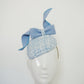 Blue swirl and whirl - Powder blue leather edged wired felt bow on a tweed petite facehugger