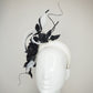 Ace of Spades - White parisisal 3D headband with leather edged crinoline swirl ,black leather flower vine and quill embellishment