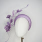 Lilac Bloom - A hand-dyed lilac headband blooming with sculptural roses and metallic swirls.