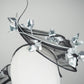 Twilight blossom - Sculptural wire pleated crinoline swirl headband with silver floral accent