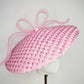 Pink Ribbon -Candy pink coolie brim crowned with a sculptural floating crinoline bow.