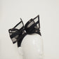 Windswept Bow - Black leather 3d headband with windswept crinoline wired bow.