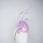 Blossoms in Flight - 	Pastel lilac pork pie pillbox with floating quills and iridescent cherry blossom detail
