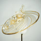 Ray of light - Wired crinoline brim with metallic swirl and pale gold crystoform Lillies.