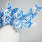 Dancing Wings - A graceful cascade of blue butterflies that appear to float effortlessly around the face.
