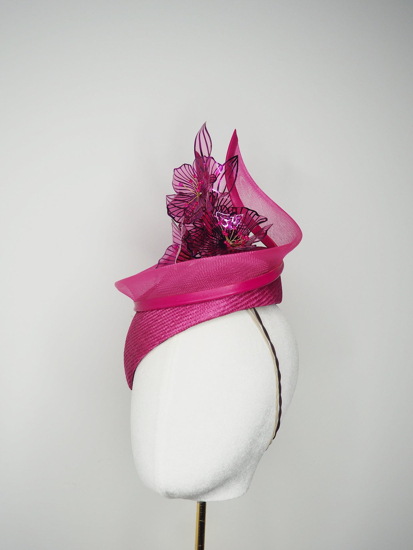 Berry Burst -Magenta hand-dyed straw facehugger base with magenta metallic edged crystoform flowers and magenta crinoline swirl