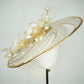 Ray of light - Wired crinoline brim with metallic swirl and pale gold crystoform Lillies.