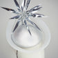 Silver Rays - Silver crinoline swirl and lurex base with floating silver starburst