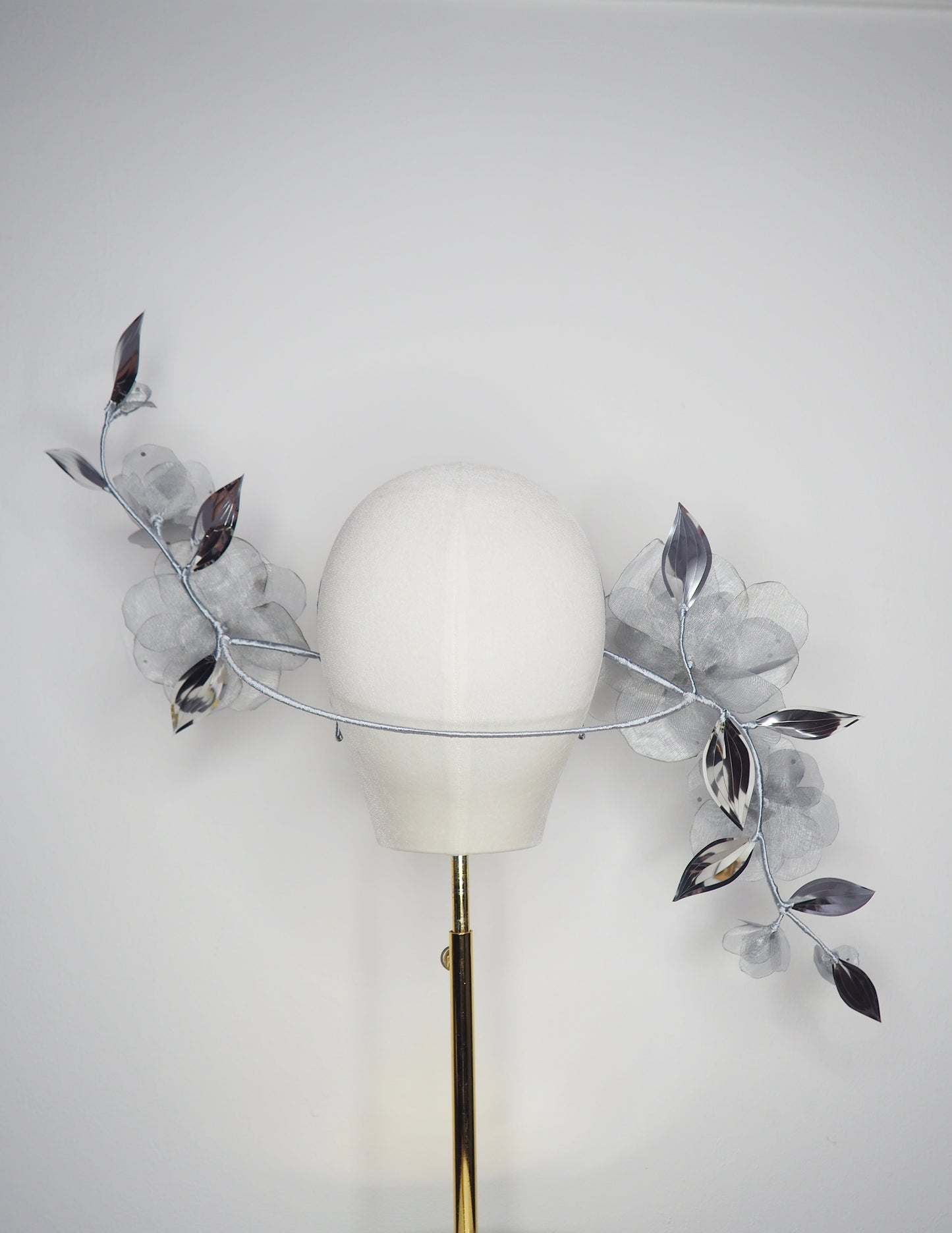 Dewdrops on Roses - Couture wraparound headpiece of sculptural silver roses sparkling with crystal dewdrops.