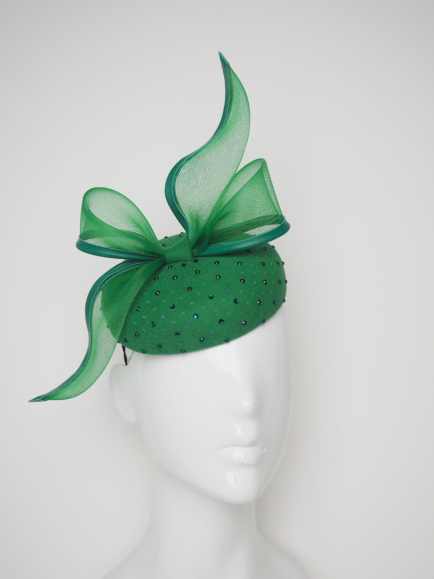 Emerald Envy - Emerald fine Fur felt button with crinoline bow and diamante veil detail.