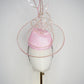 Belle Époque - pastel pink pillbox featuring a floating crystal rose surrounded by sculptural crystoform metallic swirls.