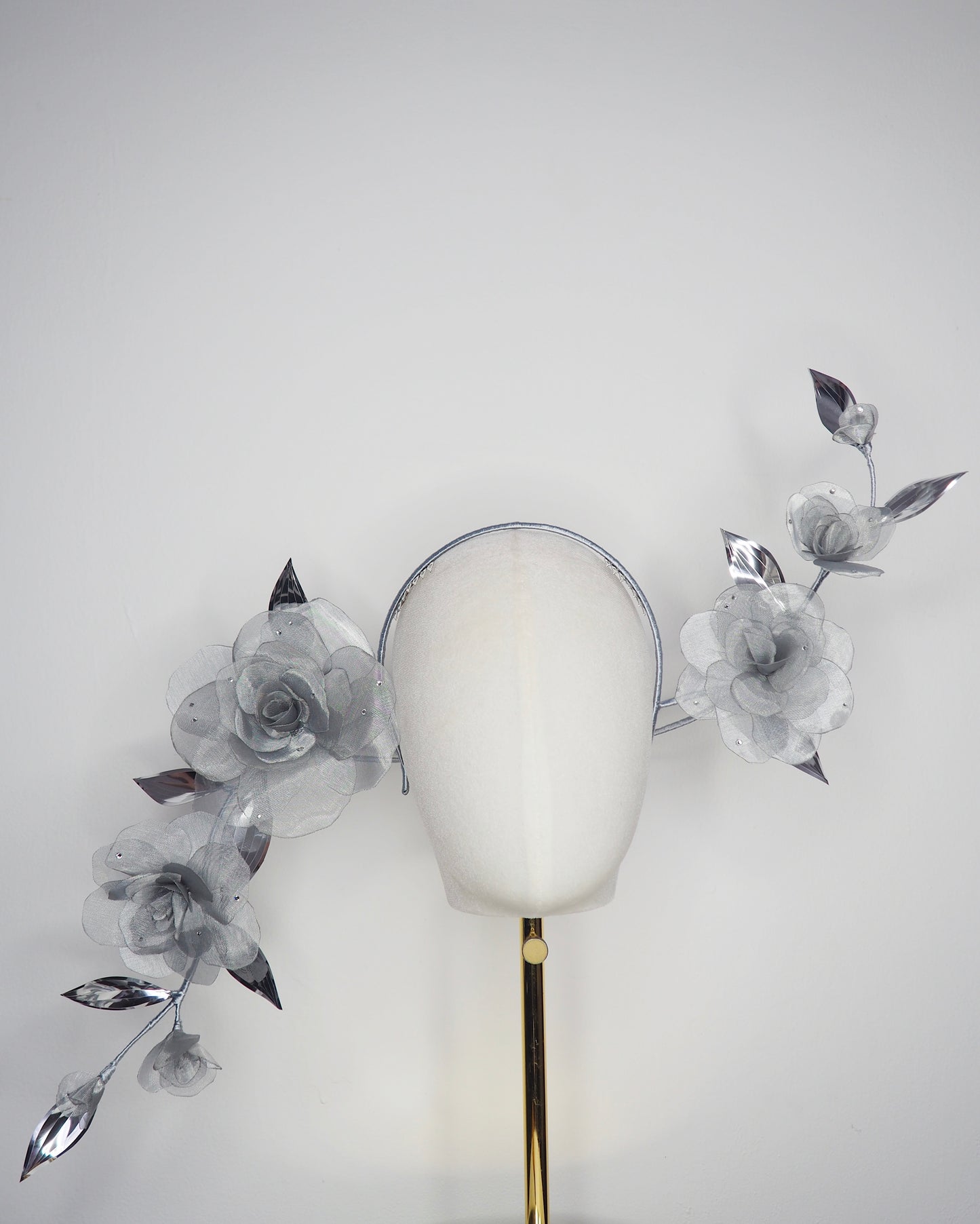 Dewdrops on Roses - Couture wraparound headpiece of sculptural silver roses sparkling with crystal dewdrops.