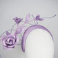 Lilac Bloom - A hand-dyed lilac headband blooming with sculptural roses and metallic swirls.