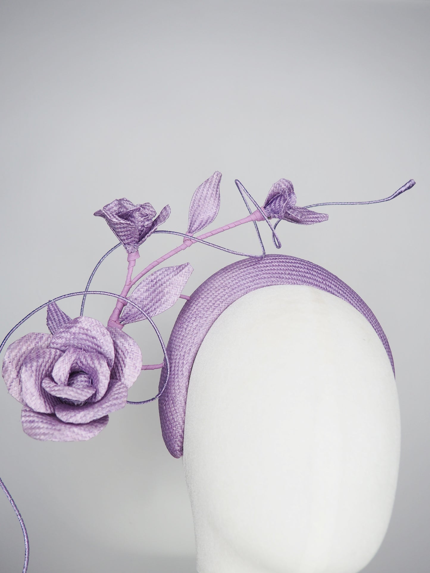 Lilac Bloom - A hand-dyed lilac headband blooming with sculptural roses and metallic swirls.