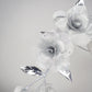 Dewdrops on Roses - Couture wraparound headpiece of sculptural silver roses sparkling with crystal dewdrops.