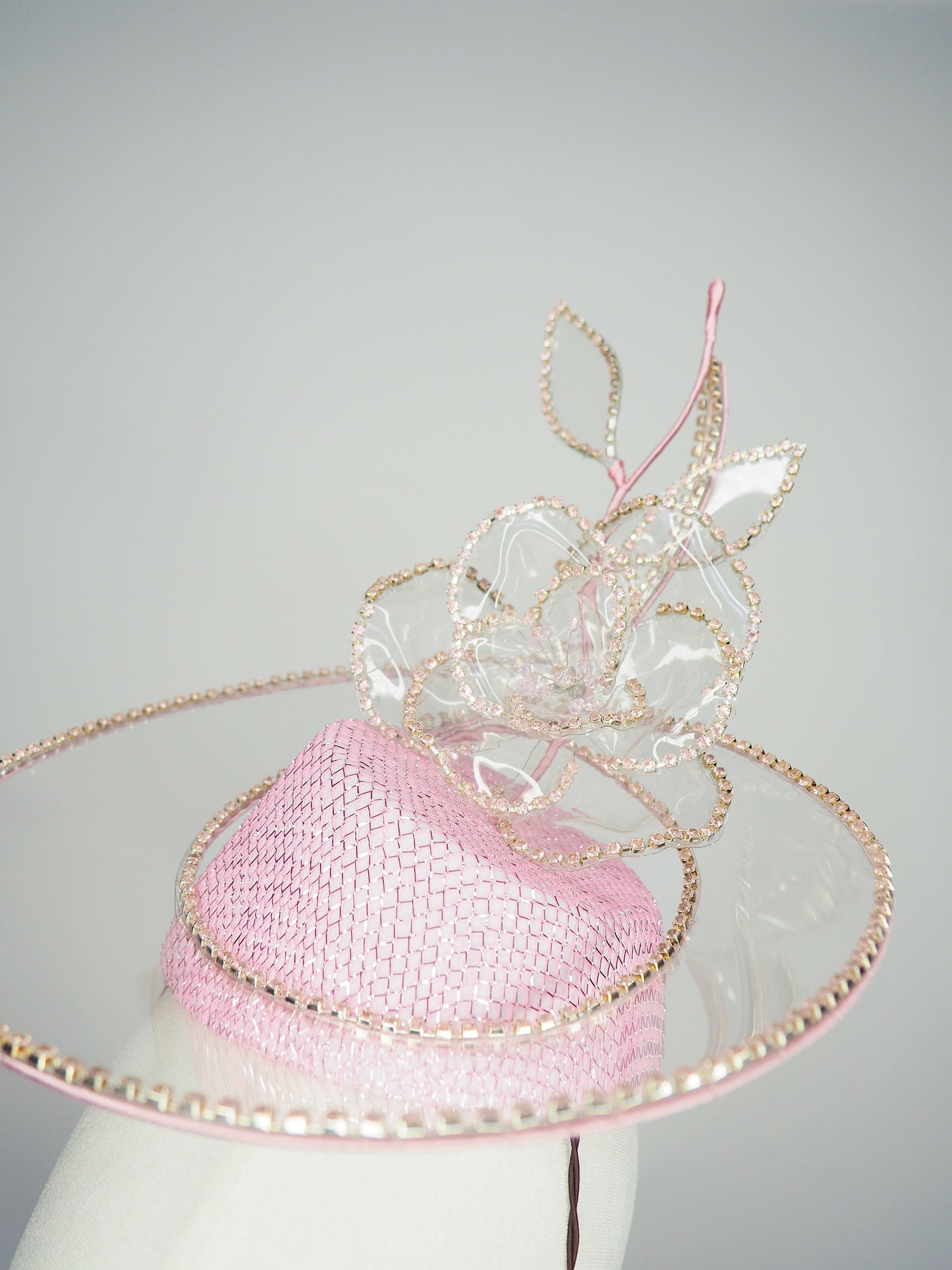 Belle Époque - pastel pink pillbox featuring a floating crystal rose surrounded by sculptural crystoform metallic swirls.
