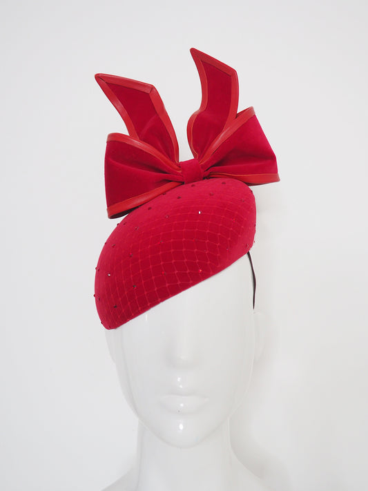 The Gift - Red wired upside down velvet bow with leather and crystal details.