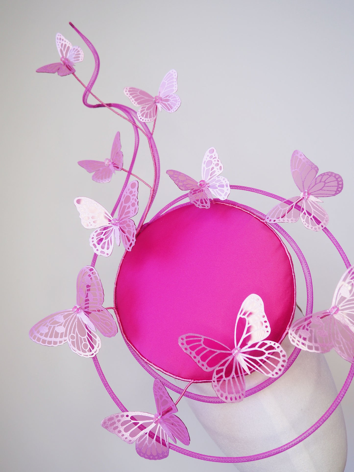 Butterfly Mirage Percher - Hot pink percher disc with tubular crinoline swirl peekaboo and cascading glitter butterflies