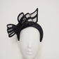 Windswept Bow - Black leather 3d headband with windswept crinoline wired bow.