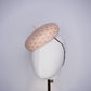 Morning Glow - A timeless nude button fascinator finished with blush crystals and elegant veiling.