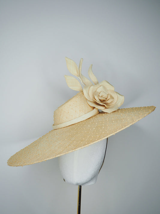 Nature in Bloom-Natural straw asymmetric brim hat with hand-sculpted rose and swirls