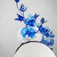 Dancing Orchids - Blue crystoform orchids on a white leather veiles percher base with veil detail